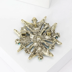 Broche étoile turque vintage dorée avec surface texturée et crochet de fixation à l'arrière