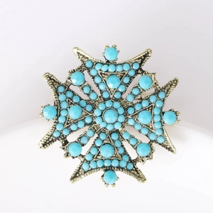 Détails de la broche étoile vintage avec perles bleues et finition en or antique