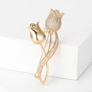 Elegant gold tulip brooch with zircon pavé and polished petals for suits and dresses