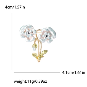 Elegante Kamelien-Brosche aus blauem Emaille mit goldenem Zweig und Blatt, 4x4,1 cm