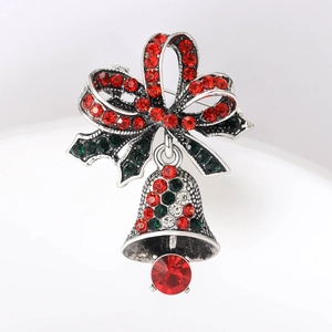 Kerstklok speldje met fonkelende rode en groene strass-steentjes op een legering