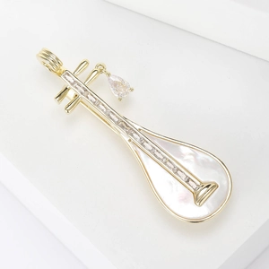 Elegant gold-plated pipa brooch with white mother of pearl inlay and zircon drop pendant