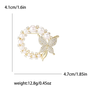 Elegant gold butterfly wreath brooch with freshwater pearls and sparkling zircons
