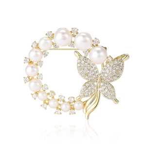 Elegant gold butterfly circle brooch with white pearls and micro-pave cubic zirconia