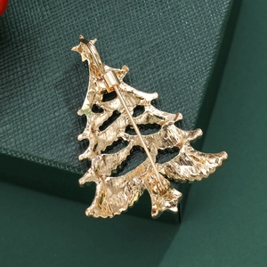Back view of gold hollow rhinestone Christmas tree brooch with secure safety pin clasp
