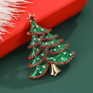 Fashion alloy hollow Christmas tree brooch with rhinestones on dark green background