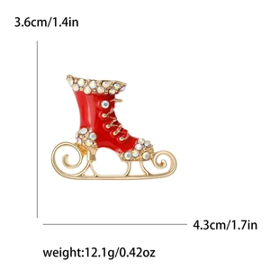 Broche de patín de hielo navideño en esmalte rojo con brillantes cristales blancos