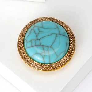 Vintage bohemian flower brooch with turquoise stone and champagne crystal trim