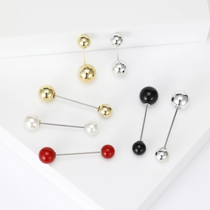 Lot de broches émaillées minimalistes en or, argent et blanc perle sur blocs de pierre