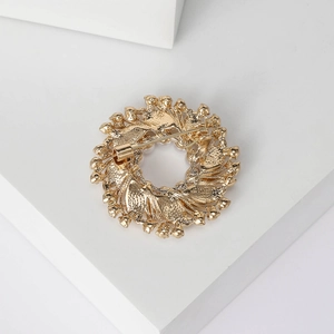 Golden pearl wreath brooch showing back view with secure metal pin and safety clasp
