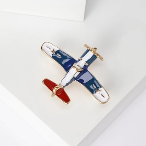 Broche avion rétro en émail bleu marine avec étoiles dorées pour hommes et femmes de style