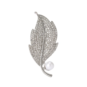 Elegant silver leaf brooch with sparkling crystals and a white faux pearl accent