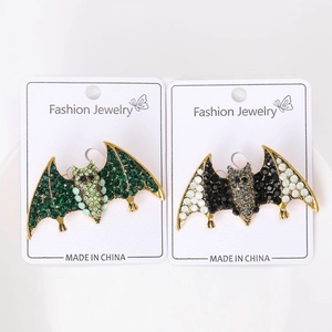 Detailed view of alloy bat brooches with colorful rhinestones and full diamond craft