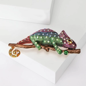 Exquisite chameleon brooch featuring colorful rhinestones on a golden tree branch base