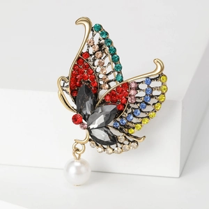 Elegant gold-plated butterfly brooch with colorful crystals and hanging pearl detail