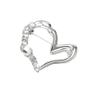 Spilla a cuore asimmetrica con strass scintillanti e finitura in metallo lucido