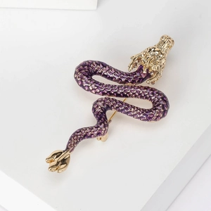 Close-up of premium purple enamel dragon brooch with gold-plated scales and intricate detail