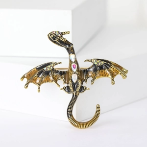 Exquisite fantasy dragon brooch in vintage gold with colorful rhinestones and enamel wings