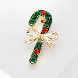 Creative Christmas cane brooch with red green crystals and golden bow tie detail