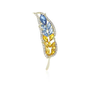 Elegante spilla a spiga di grano con cristalli marquise colorati e finitura oro