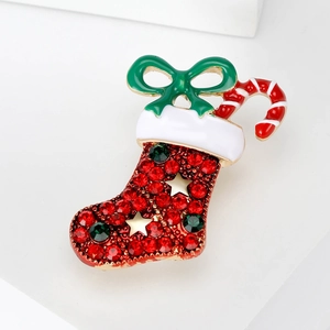 Broche botte du Père Noël avec strass rouges étincelants et nœud en émail vert