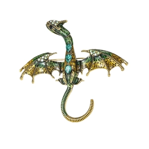 Elegant green and gold dragon brooch with enamel finish and sparkling emerald gems