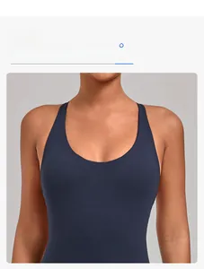 Detail view of the elegant U-neck design and elastic fabric on this navy sports jumpsuit