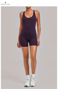 Close-up of blackberry purple athletic romper with cross back and high-stretch fabric detail