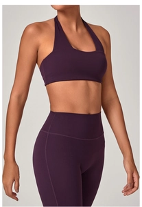 Dettaglio completo completo yoga viola scuro con leggings a vita alta e reggiseno