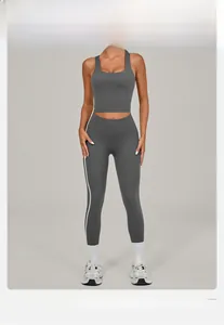 Detail of grey yoga set featuring square neck tank top and side stripe leggings