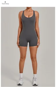 Front view of charcoal grey high-stretch yoga bodysuit with U-neck and tight shorts