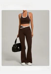 Detail view of contrast trim yoga set with U-neck tank top and crossover flare pants