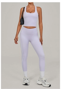 Detail of lavender yoga set with high waist leggings and white side stripe stitching