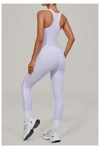 Side view of light purple yoga set with racerback top and striped high waist leggings