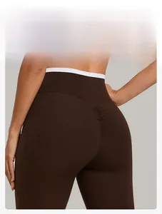 Detail of scrunch butt yoga leggings in dark brown with seamless kontour and side pockets