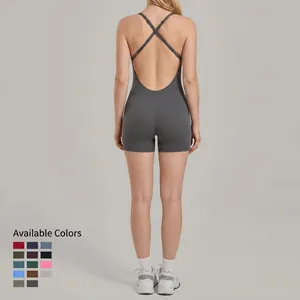 Sleek backless yoga bodysuit in dark grey with crisscross straps and slim fit design