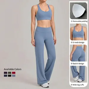 Tweeledige yogaset met grijsblauwe sportbeha en broek met hoge taille en wijde pijpen