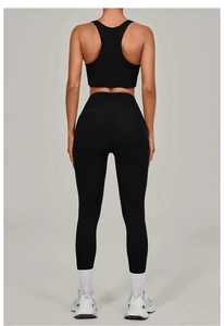 Rear view of black seamless high-waisted yoga leggings and racerback sports bra set