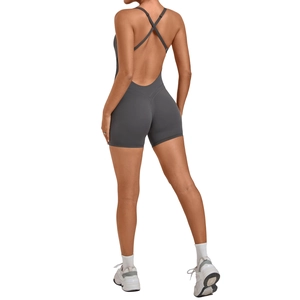 Dark grey backless yoga jumpsuit with crisscross straps and slim fit high-stretch fabric