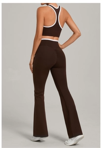 Detail view of high-waist flared yoga pants with butt-lifting seam and side pockets