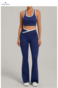 Navy blue yoga set detailing white V-shaped contrast waistband and flared sports leggings