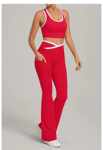Detailed view of red contrast yoga set featuring V-shaped waistband and side pockets
