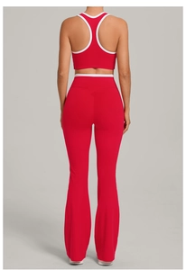 Detail view of red yoga set with U-neck racerback top and flared leggings for women