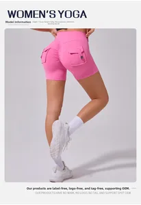 Detail of pink scrunch butt yoga shorts showing high waist and buttoned side pockets