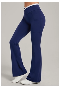 Detail of high-waisted yoga flare pants with crossover contrast waist and side pocket