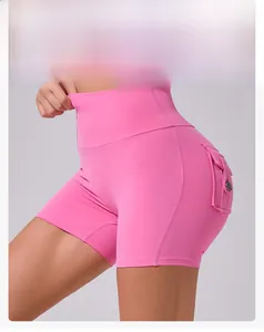 Detail of high waist yoga shorts featuring side cargo pocket with button closure and stitching