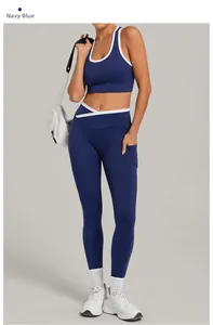 Detail von marineblauem Yoga-Set mit weißem Kontrastrand und hoher Cross-Taille Hose