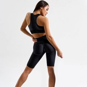 Detail of high-waist yoga shorts with honeycomb texture for butt-lifting effect