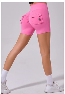 Detailed back view of pink high-waisted scrunch yoga shorts with buttoned pockets