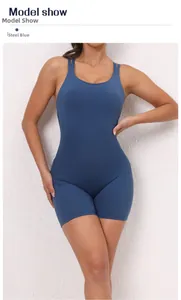 Front view of model wearing steel blue one-piece yoga jumpsuit for fitness and workout